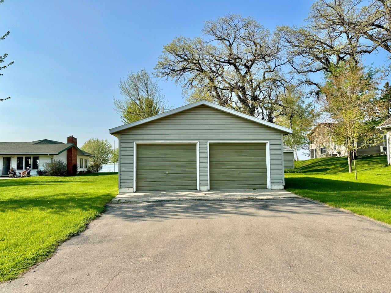 13-Includes 2-car garage and storage shed.jpg