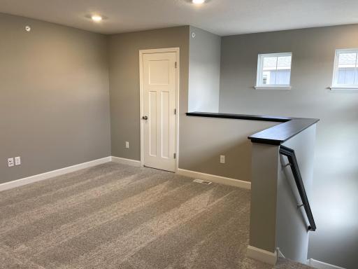 Relax, play and enjoy! This upper loft space provides the perfect hang out space and is conveniently located adjacent to all three of the upper level bedrooms.