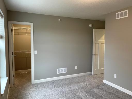 Each of the home's secondary bedrooms on the upper level come perfectly sized.