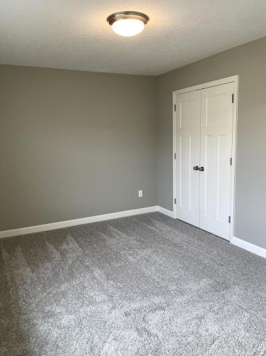 Each of the home's secondary bedrooms on the upper level come perfectly sized.