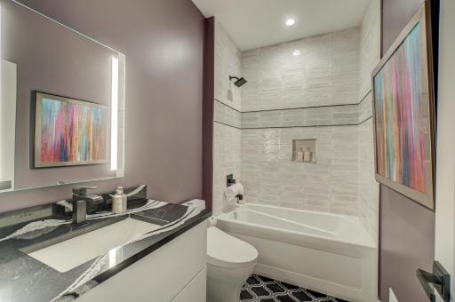 This main level full bathroom is perfect for guests