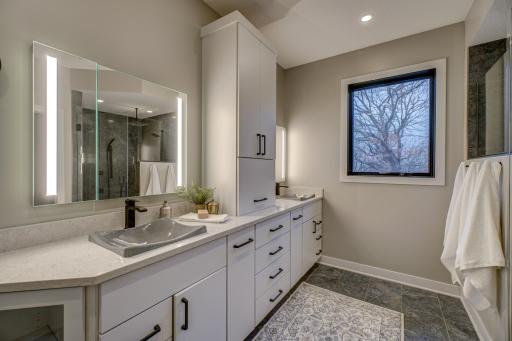 Youâll appreciate the double vanity and in-floor heat as you get ready for your day