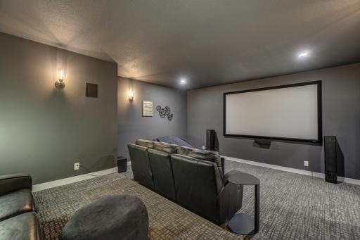 Watch your favorite movies in your own private theater with tiered seating and fully equipped surround sound system