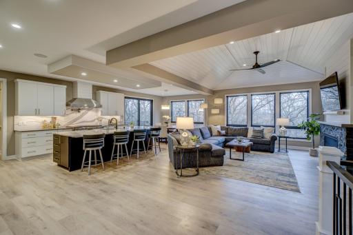 Entertain in this expansive and open great room where walls of windows frame tranquil nature views