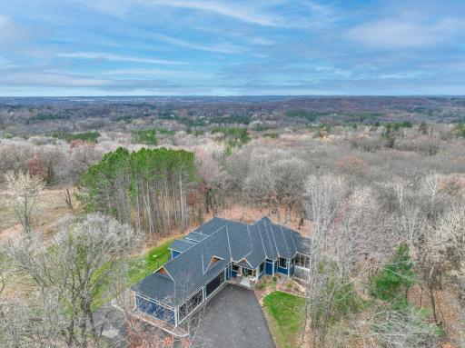 Nestled at the end of a private cul-de-sac backing up to majestic oak trees