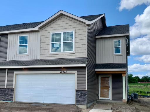 Pardon the mess, we're still under construction! Driveway, irrigation and sod are included and will be installed soon! Photo of subject home.