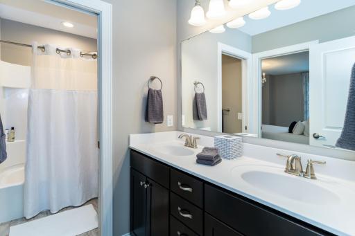 Upper Level Jack and Jill Full Bathroom connecting Bedroom's 2 & 3.