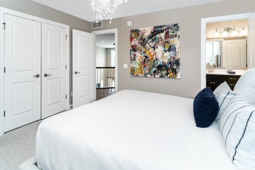 Upper Level Bedroom #2 with Custom Closet System in Place.