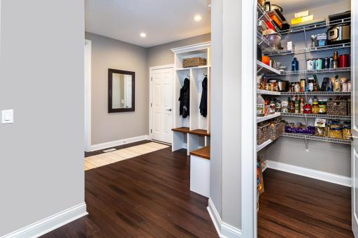 Entry from the Garage and Walk In Pantry with added Shelving.