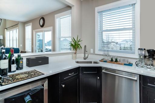 Inside the new Wet Bar~ Custom Cabinets, Dishwasher and Beverage Fridge.
