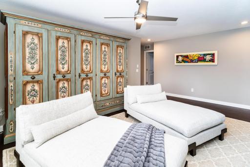 Upper Level Loft and Walk Way to the bedrooms. All carpet removed where you see hardwood floors from the staircase through the loft into the Primary Ensuite.