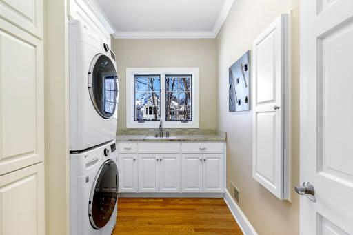 The main level laundry room is spacious and bright with natural light.