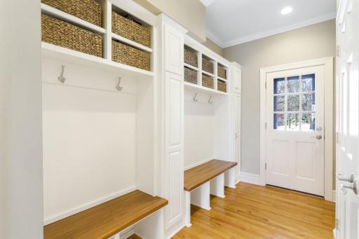 The mudroom can be accessed through the garage door and front service door.