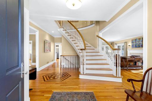 Beautiful, custom wood floors span the main floor which is flooded with natural light.