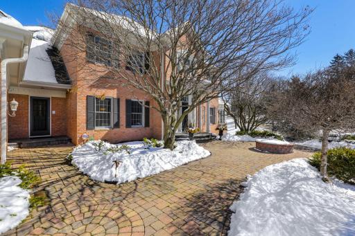 The home is set on a desirable lot in the highly sought after, Crowne Hill neighborhood, a winding, dead-end cul-de-sac, with spacious, maturely wooded lots.