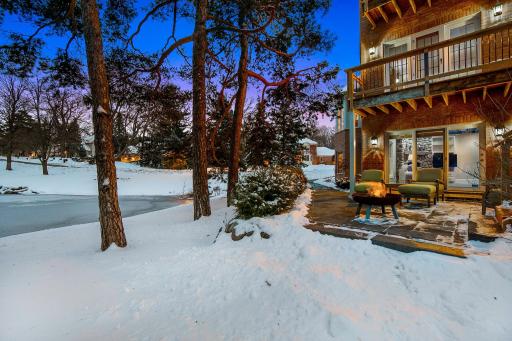 The lower level walks out to a cozy backyard paver patio.