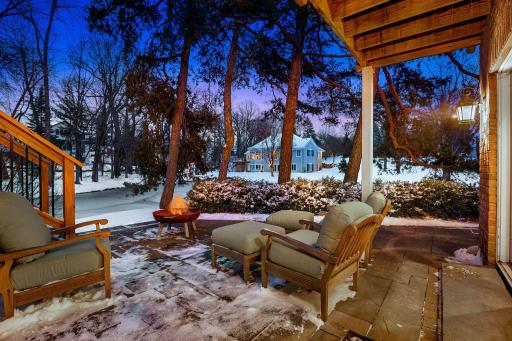 The lower level walks out to a cozy backyard paver patio.