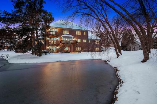 The home is surrounded with privacy and has beautiful views of the backyard pond.