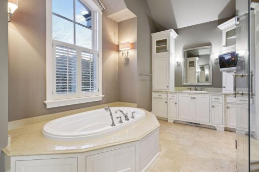 Primary Bath with jetted tub, walk in shower, private water closet