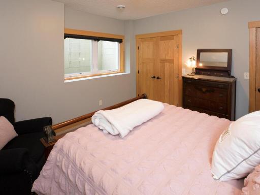 Lower level Bedroom with Safety Egress window.