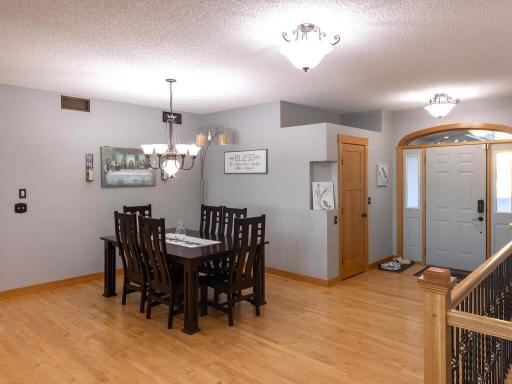 Open dining area with all maple flooring.
