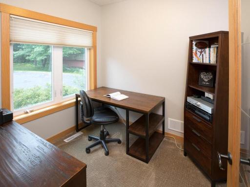 Front office room with views of arriving guests and packages. Perfect work from home office.