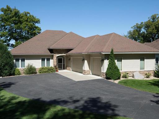 Inviting Lakefront Home with Spacious Garage!