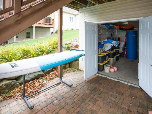 Surprise! This exterior access is to a large storage bunker for water toys, life jackets, and everything lakeside!