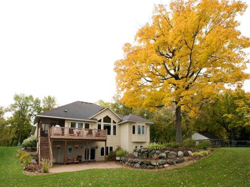 Large Lower Level Patio with deck access to the lake.
