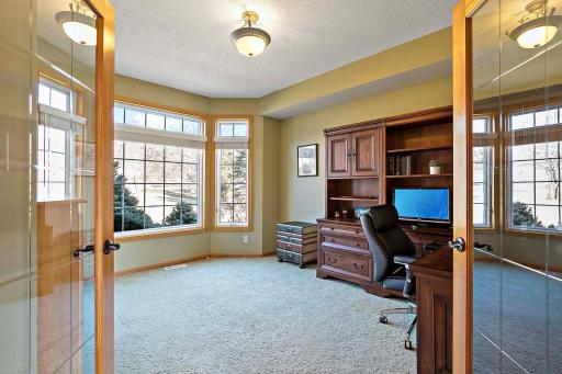 First impressions matter and you will have it covered with your main floor office in the front of your new home.