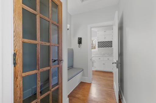 Access to Lower level off Foyer with Boot Bench; access to Butlers Pantry/Kitchen