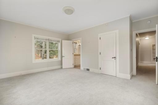 Main Floor 3rd Bedroom with adjacent walk-through bathroom