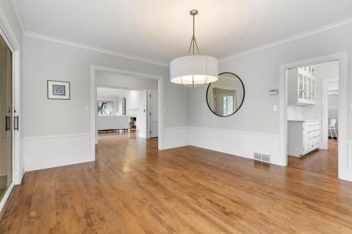 Dining Room adjacent to kitchen and walkout to screened porch lakeside