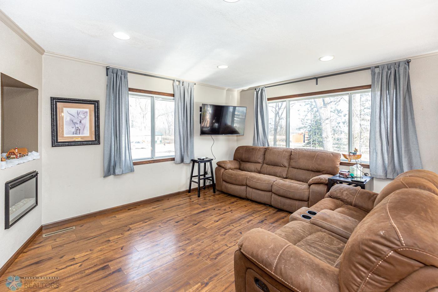Living Room Laminate flooring throughout upper level