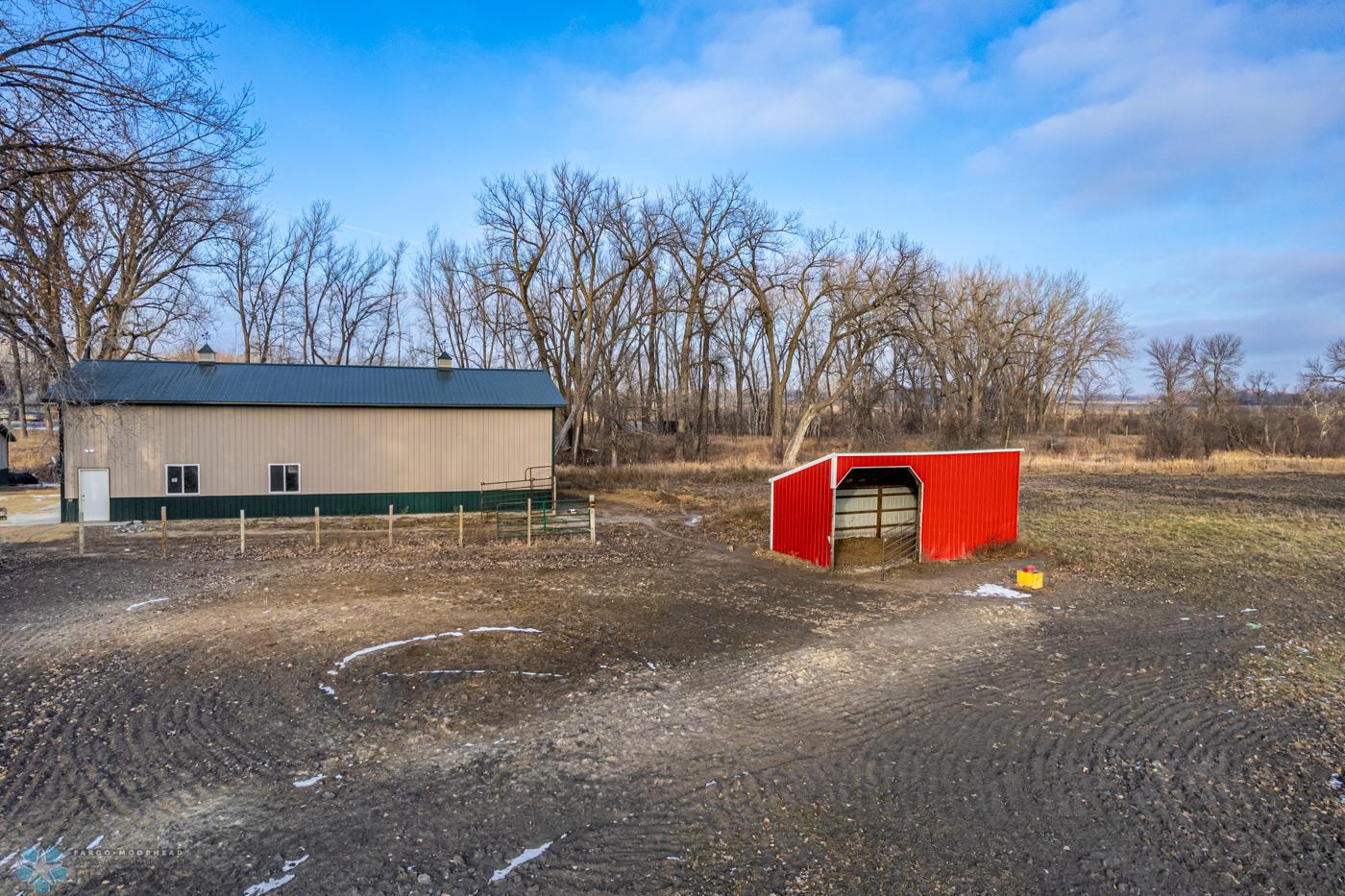 Pasture Partially enclosed horse shelter, pasture area and barn, Ritchie Watering System