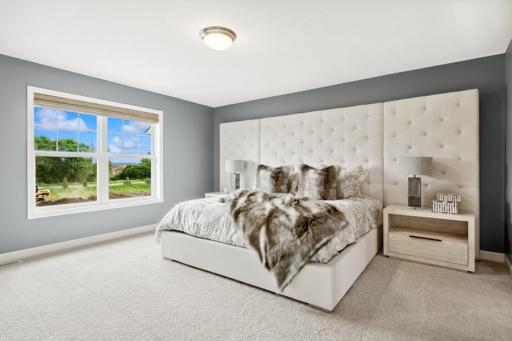 Enjoy the serenity of a private bath and huge walk-in closet. (Photo is of a decorated model, actual homes features may vary)