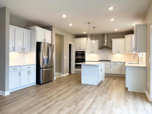 Progress photo of the gourmet kitchen with stunning backsplash. 12.22.23.