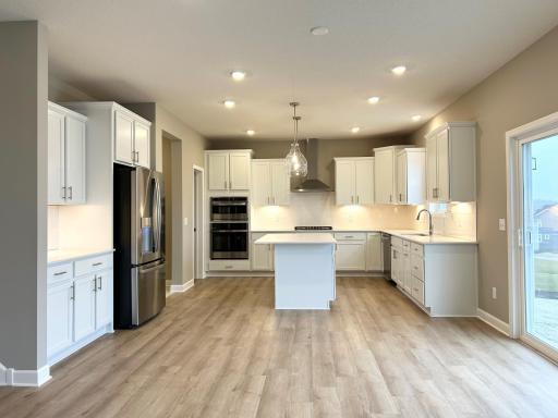 Progress photo of the gourmet kitchen with stunning backsplash. 12.22.23.