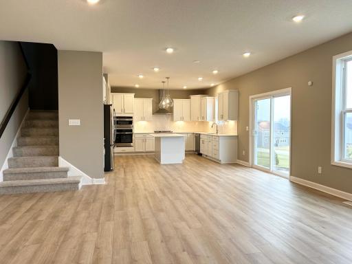 Progress photo of the main floor living space into the kitchen. 12.22.23