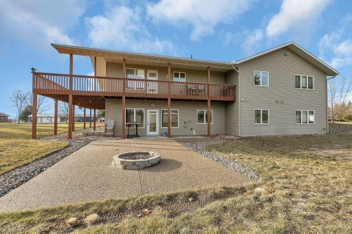 Enjoy an evening on the exposed aggregate patio with a built in firepit.