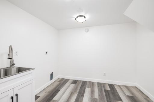 Fully finished, spacious laundry room w/lots of extra storage space (ask for w/d w/the right offer)
