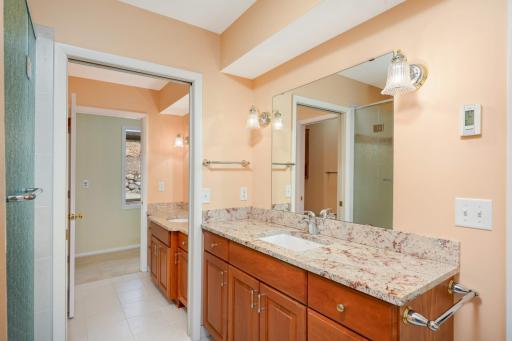 Owner’s bath separates into two distinct areas