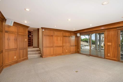 Lower level family room with access to patio and lake