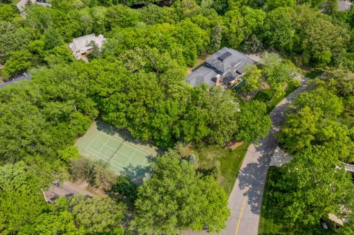 Double Lot (1.64 Acres) Professionally Landscaped with Full Size Tennis Court