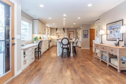 Lakeside Gourmet Kitchen with Center Island, Granite Countertops, Top of Line Appliance & Built-in Office Deck