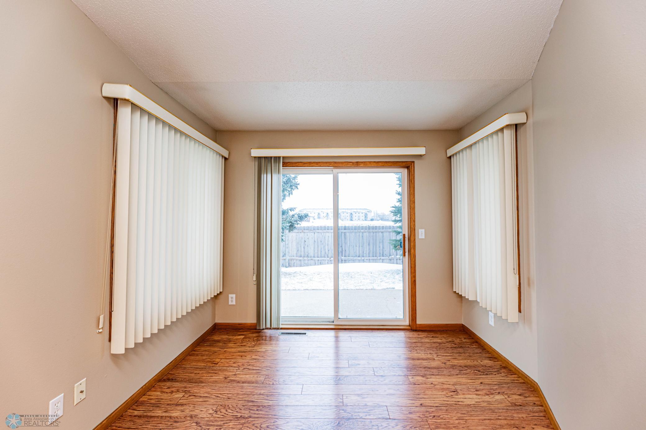 Sunroom/Office Vinyl Plank Flooring to Patio