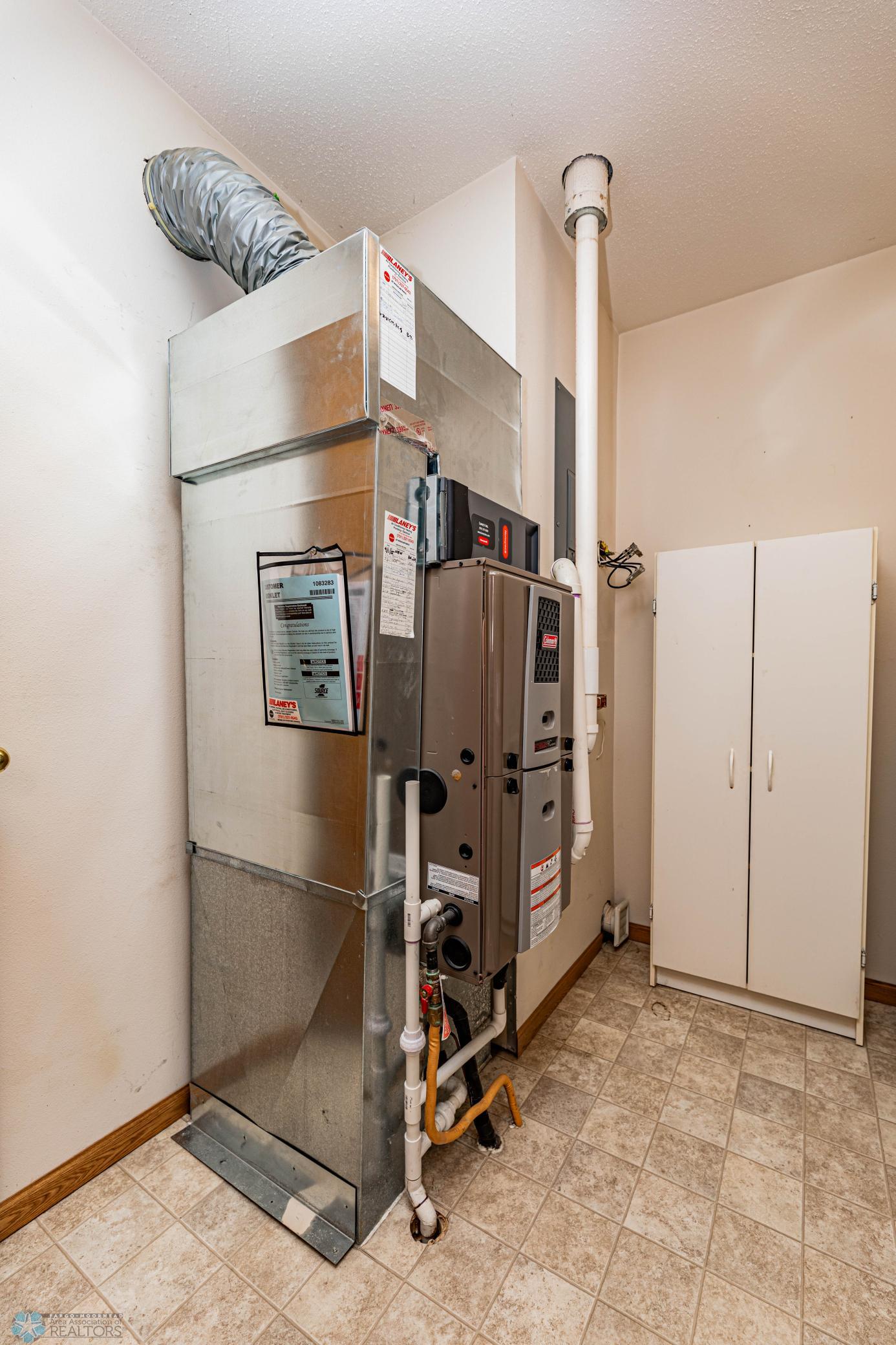 Utility room furnace is 8 yrs old