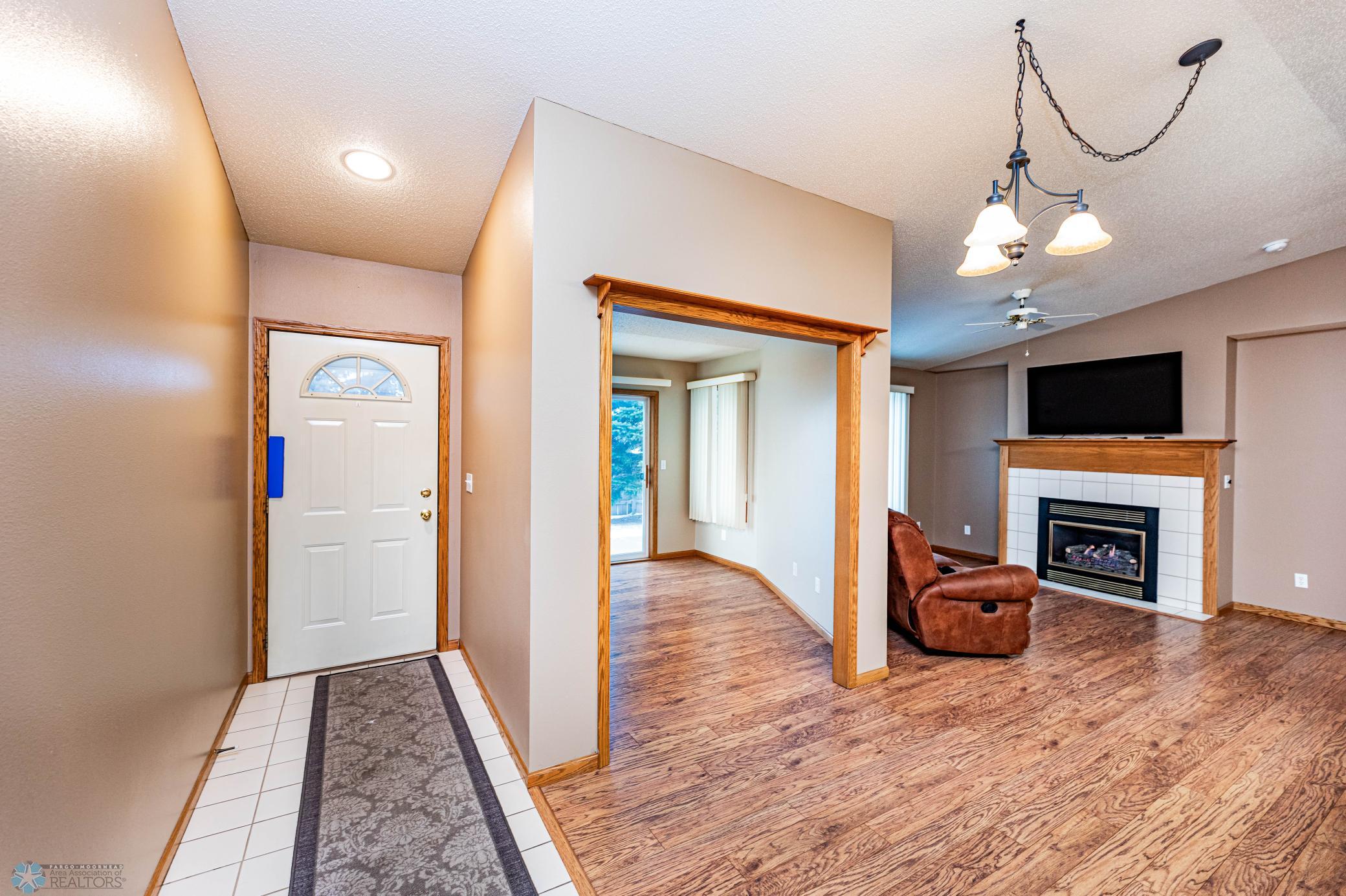 Foyer with tiled flooring
