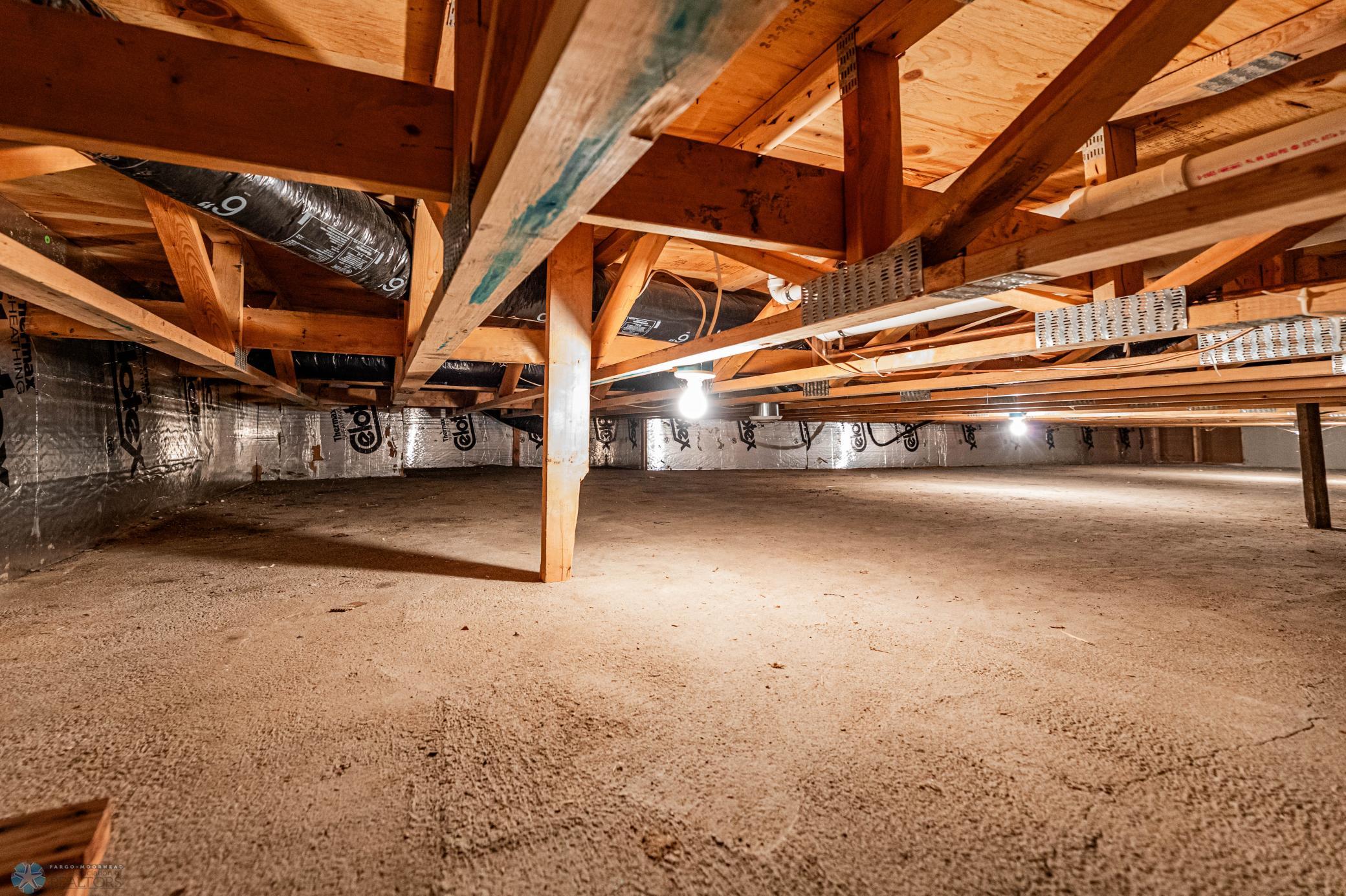Crawl space storage. Lit, clean, dry