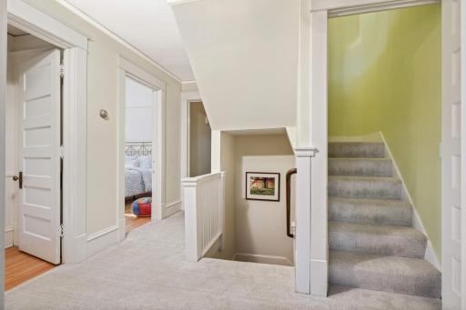 Photo for 4332 Fremont Avenue S, Minneapolis, MN 55409 - Listing #6469121 Second level landing from main level and up to third level